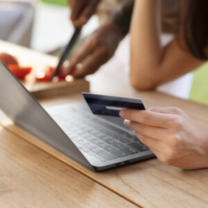 close up person doing online shopping
